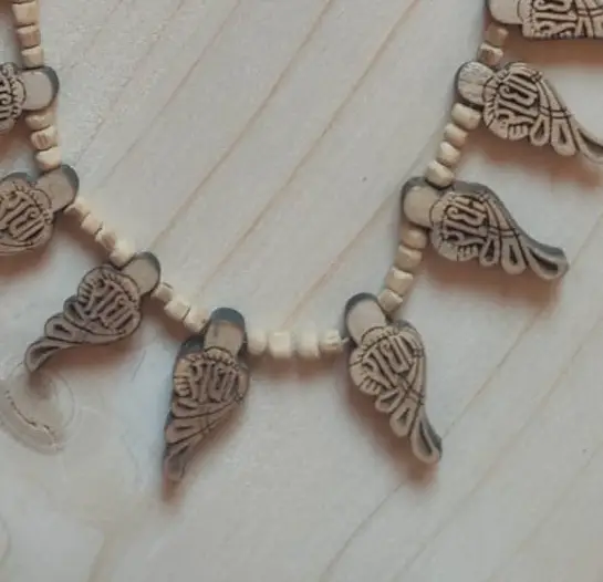 Tulasī kanthimāla ar Rādhārānī vārdu